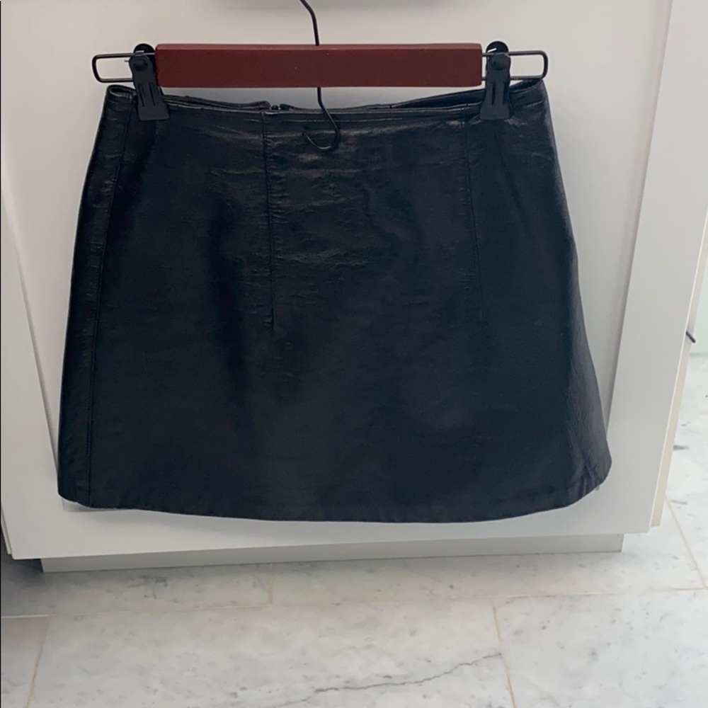 Hot black leather mini skirt
